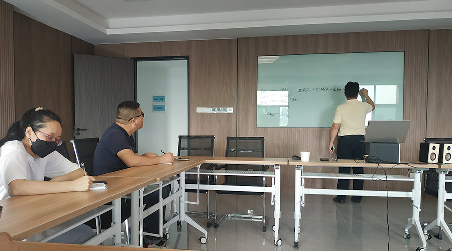 金環(huán)電器組織員工進(jìn)行滾筒干衣機知識理論培訓